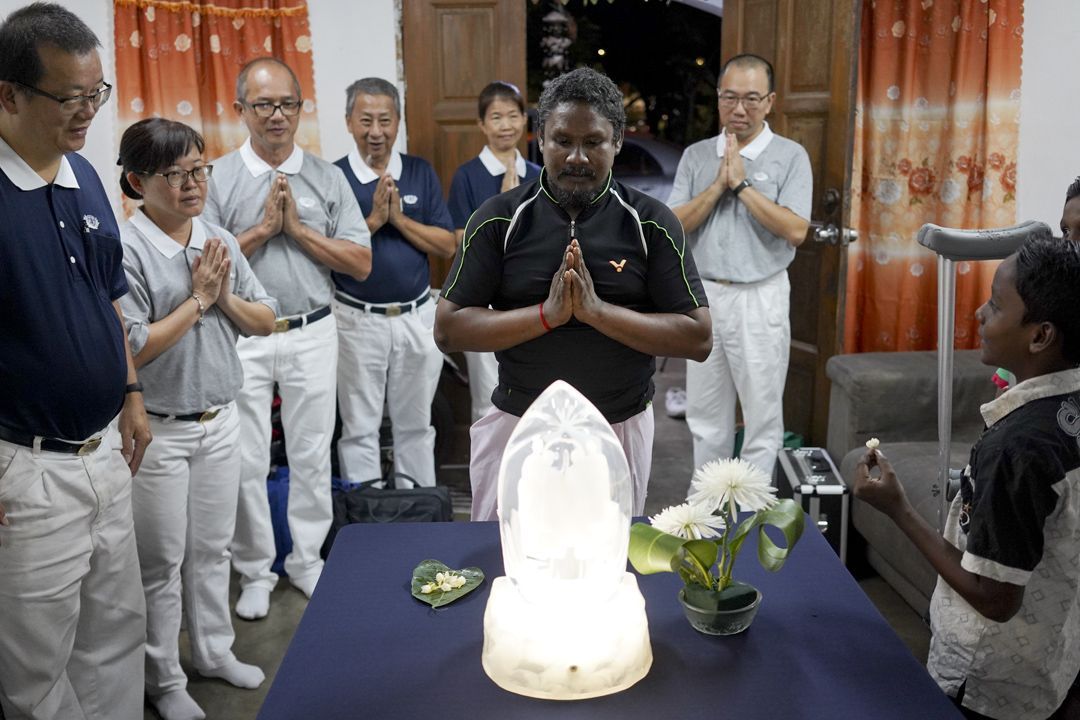 Ravikumar a/l Muniandy prayed for his sons to grow up in a carefree environment. He was also grateful to the volunteers for supplying him with medical attention. [Photograph by Boon Wui Kong]