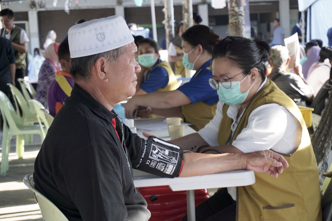 There were quite a number of Muslim elderly seeking medical treatment during the medical outreach. [Photograph by Amita Lim Ching Ying]